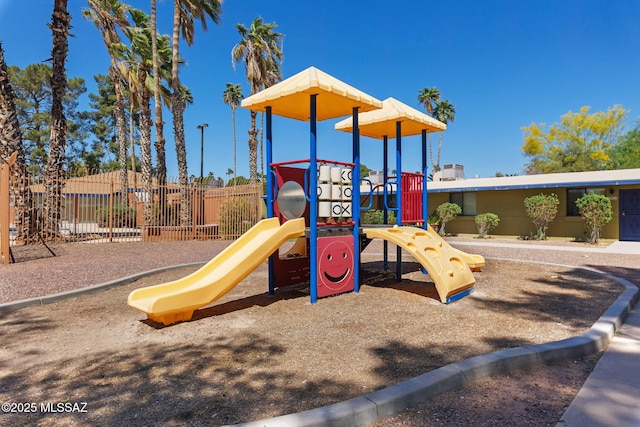 community playground featuring fence