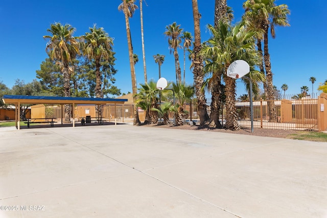 view of sport court featuring fence and community basketball court