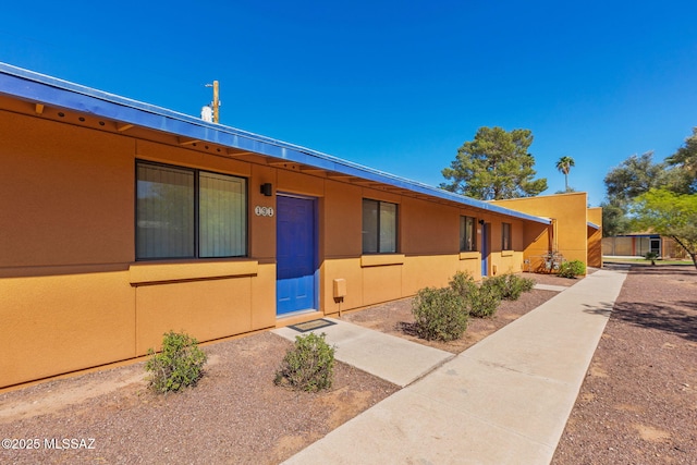 view of front of home with stucco siding