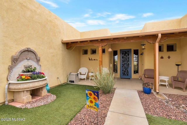 7871 W Tree Frog Trl, Tucson, AZ 85735 - property entrance with stucco siding
