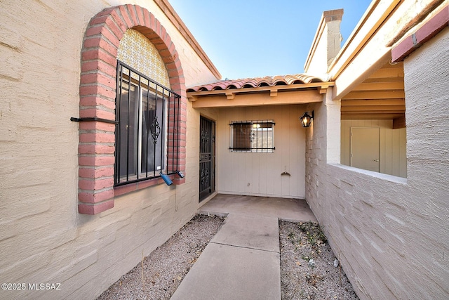 2712 N Beverly Ave, Tucson, AZ 85712 - property entrance with a tiled roof
