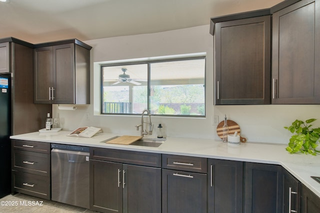 4921 N Boyd Ln, Tucson, AZ 85750 - kitchen featuring a sink, dishwasher, dark brown cabinetry, and light countertops