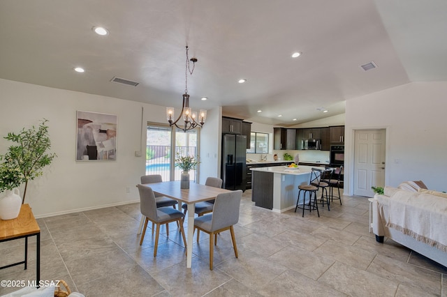 4921 N Boyd Ln, Tucson, AZ 85750 - dining area featuring recessed lighting, visible vents, an inviting chandelier, and lofted ceiling