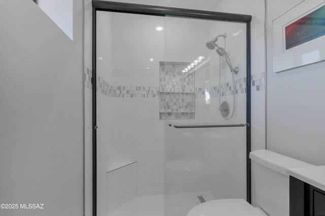 4921 N Boyd Ln, Tucson, AZ 85750 - bathroom featuring vanity, toilet, and a stall shower