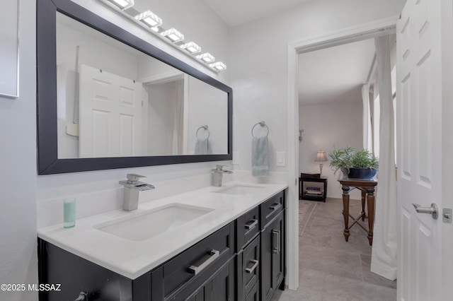 4921 N Boyd Ln, Tucson, AZ 85750 - full bathroom featuring double vanity, tile patterned floors, and a sink