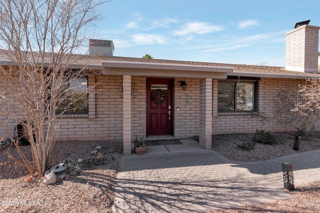 4921 N Boyd Ln, Tucson, AZ 85750 - entrance to property featuring brick siding and a chimney
