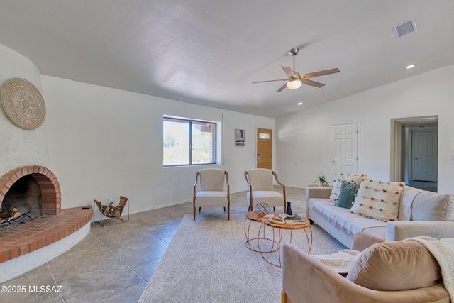 4921 N Boyd Ln, Tucson, AZ 85750 - living room with a fireplace, a ceiling fan, recessed lighting, vaulted ceiling, and visible vents