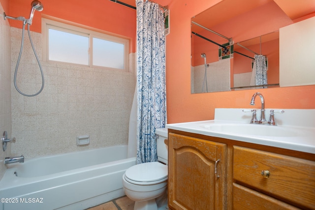 full bath featuring vanity, toilet, and shower / tub combo