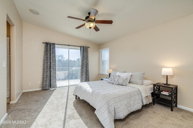10261 N Wild Turkey Ln, Oro Valley, AZ 85737 - carpeted bedroom featuring access to outside, baseboards, a ceiling fan, and lofted ceiling