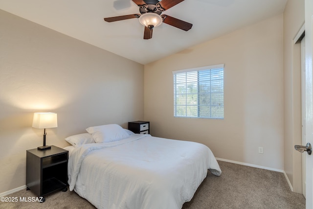 10261 N Wild Turkey Ln, Oro Valley, AZ 85737 - bedroom featuring baseboards, ceiling fan, vaulted ceiling, and light colored carpet