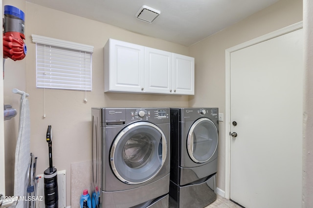 10261 N Wild Turkey Ln, Oro Valley, AZ 85737 - washroom featuring cabinet space and independent washer and dryer