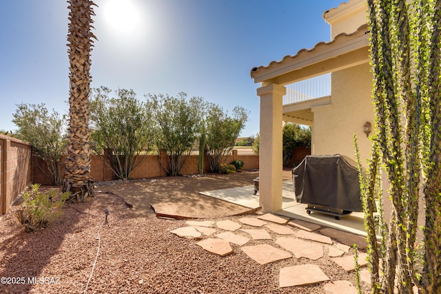 10261 N Wild Turkey Ln, Oro Valley, AZ 85737 - view of yard with a fenced backyard and a patio