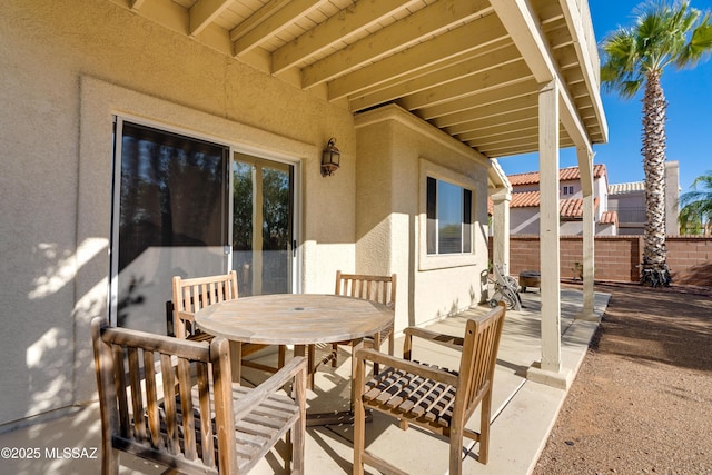 10261 N Wild Turkey Ln, Oro Valley, AZ 85737 - view of patio / terrace featuring outdoor dining area and fence