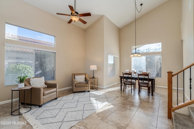 10261 N Wild Turkey Ln, Oro Valley, AZ 85737 - sitting room featuring stairway, high vaulted ceiling, and baseboards