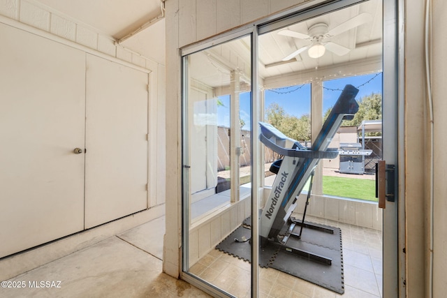 workout area with ceiling fan