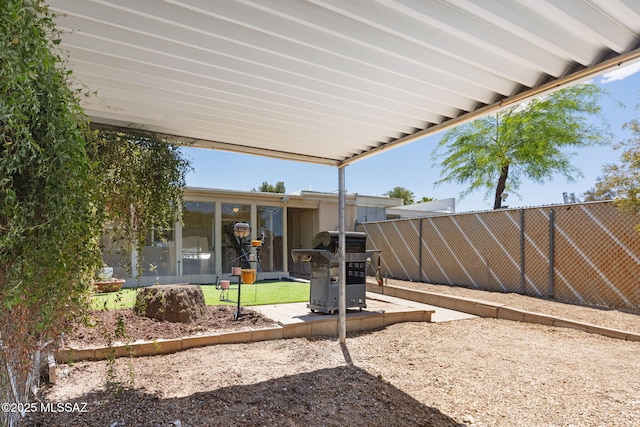 view of yard featuring a fenced backyard and a patio area