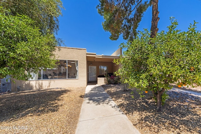 view of front of property featuring stucco siding