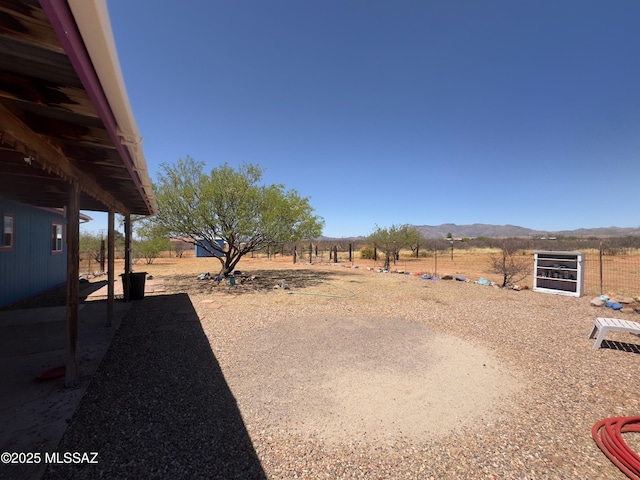 view of yard with a mountain view