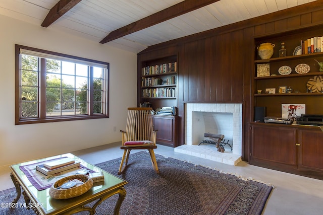 2626 E 4th St, Tucson, AZ 85716 - sitting room with wooden ceiling, beamed ceiling, wood walls, and built in features