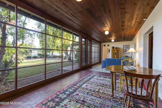 2626 E 4th St, Tucson, AZ 85716 - sunroom with wooden ceiling, brick floor, and french doors