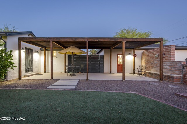 2626 E 4th St, Tucson, AZ 85716 - back of property featuring a yard, fence, and a patio area