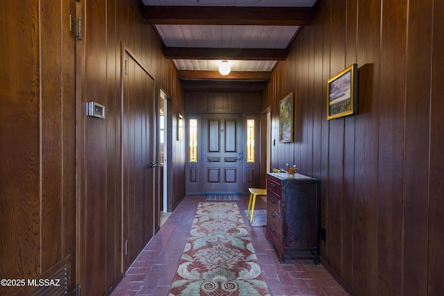2626 E 4th St, Tucson, AZ 85716 - doorway with wood walls, brick floor, and beamed ceiling