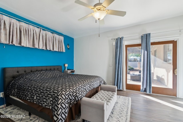 13960 E Placita Simpatica, Vail, AZ 85641 - bedroom with wood finished floors and ceiling fan