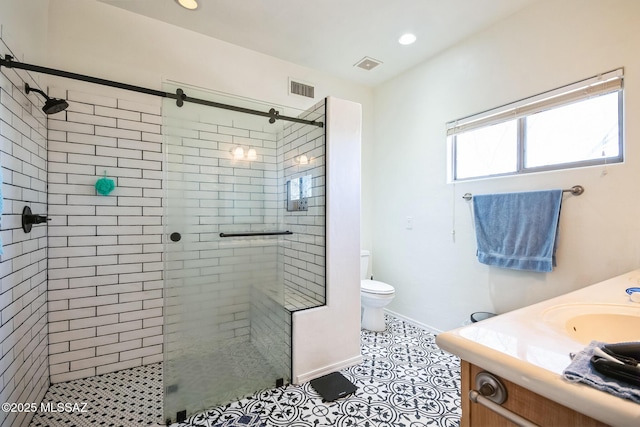 13960 E Placita Simpatica, Vail, AZ 85641 - bathroom with toilet, a shower stall, vanity, and recessed lighting