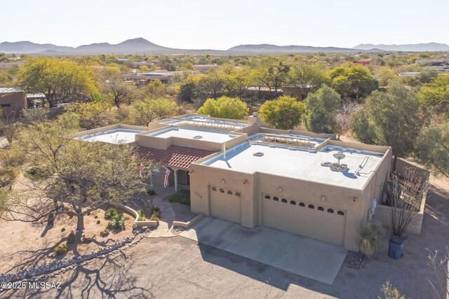 13960 E Placita Simpatica, Vail, AZ 85641 - pueblo-style home with stucco siding, driveway, and a garage