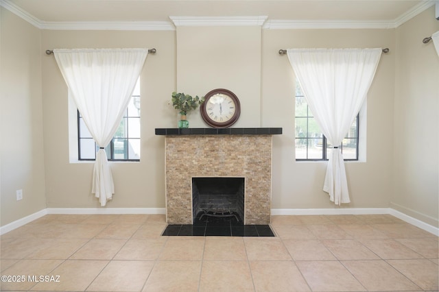 1025 N Perry Ave, Tucson, AZ 85705 - unfurnished living room with a healthy amount of sunlight, a fireplace, and crown molding