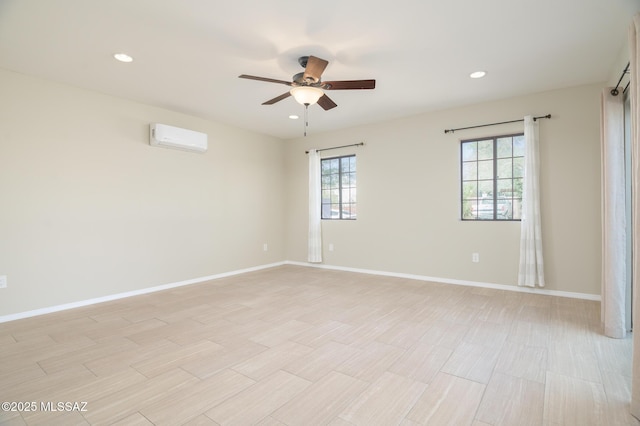 1025 N Perry Ave, Tucson, AZ 85705 - unfurnished room with ceiling fan, a wall mounted air conditioner, recessed lighting, and baseboards
