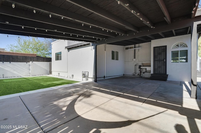 1025 N Perry Ave, Tucson, AZ 85705 - view of patio featuring fence and entry steps
