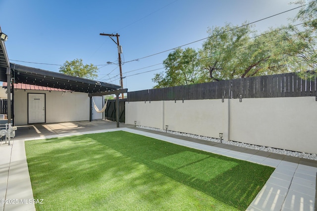 1025 N Perry Ave, Tucson, AZ 85705 - view of yard featuring a patio area and fence