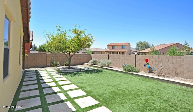 8573 N Western Juniper Ter, Tucson, AZ 85743 - view of yard featuring a fenced backyard