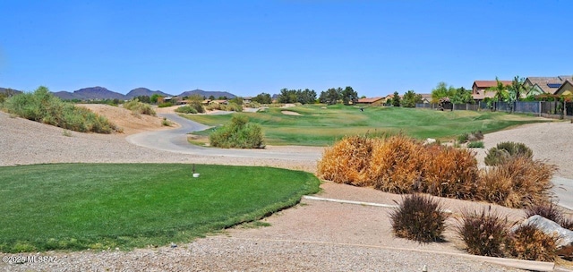 8573 N Western Juniper Ter, Tucson, AZ 85743 - view of community with fence, a residential view, a mountain view, and golf course view