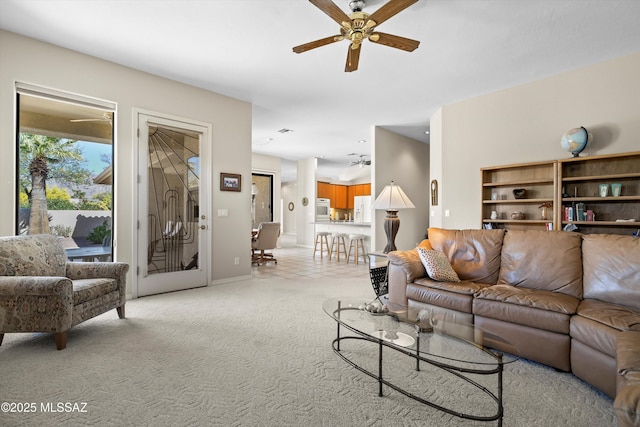 1040 W Stargazer Pl, Oro Valley, AZ 85737 - living area with a ceiling fan, light colored carpet, and baseboards