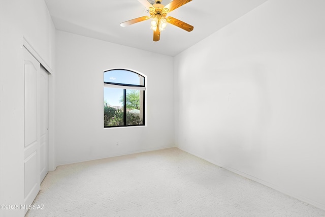 1040 W Stargazer Pl, Oro Valley, AZ 85737 - unfurnished bedroom featuring a closet, baseboards, and a ceiling fan