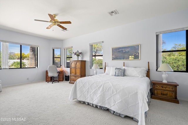 1040 W Stargazer Pl, Oro Valley, AZ 85737 - carpeted bedroom with a desk, baseboards, and a ceiling fan