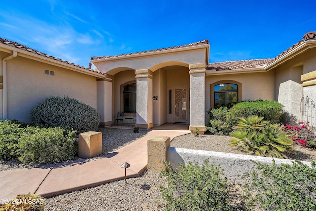 1040 W Stargazer Pl, Oro Valley, AZ 85737 - doorway to property with stucco siding and a tiled roof