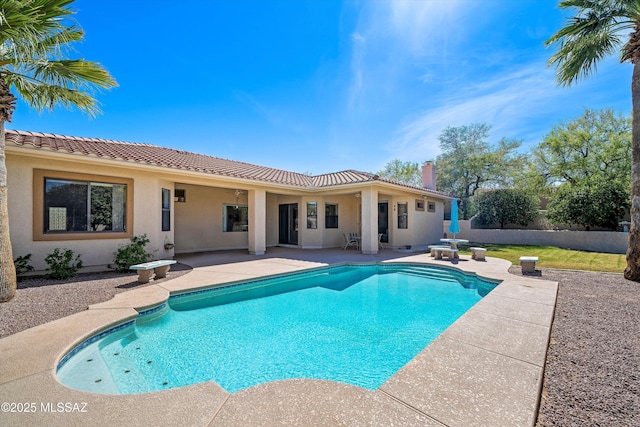 1040 W Stargazer Pl, Oro Valley, AZ 85737 - back of property featuring a patio area, a tiled roof, stucco siding, fence, and a chimney