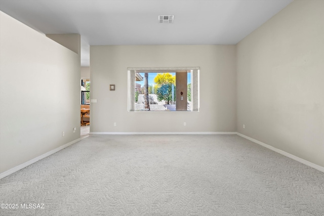 1040 W Stargazer Pl, Oro Valley, AZ 85737 - spare room featuring carpet flooring and baseboards