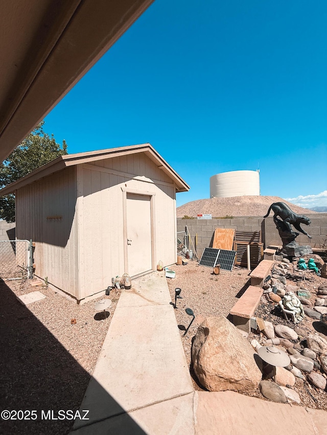 2692 W Dove Ln, Thatcher, AZ 85552 - view of property exterior featuring a shed, an outdoor structure, and fence