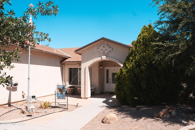 2692 W Dove Ln, Thatcher, AZ 85552 - view of front facade featuring stucco siding and roof with shingles