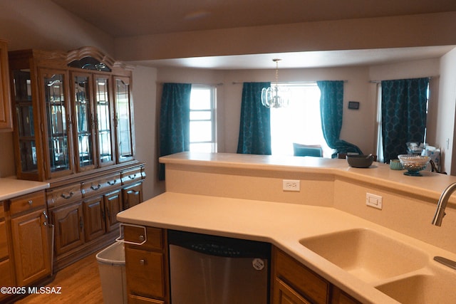 2692 W Dove Ln, Thatcher, AZ 85552 - kitchen with dishwasher, a sink, light countertops, and decorative light fixtures
