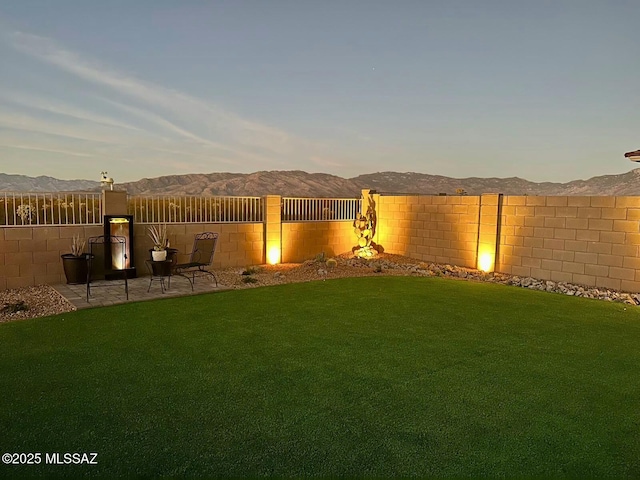 12100 E Ryscott Cir, Vail, AZ 85641 - view of yard with a mountain view, a patio, and a fenced backyard
