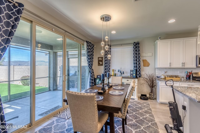 12100 E Ryscott Cir, Vail, AZ 85641 - dining space featuring recessed lighting and light wood-type flooring
