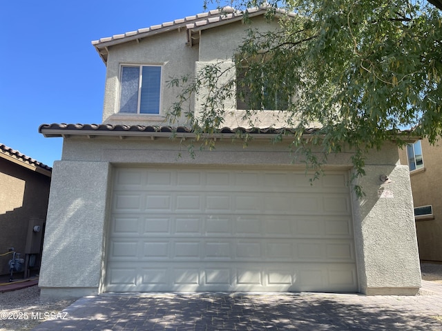 garage with driveway