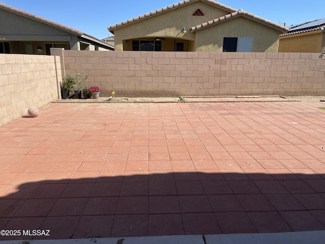 view of patio with fence
