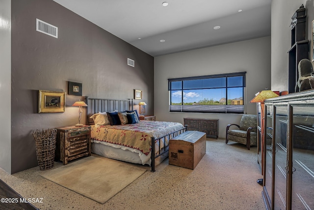 bedroom with visible vents and recessed lighting