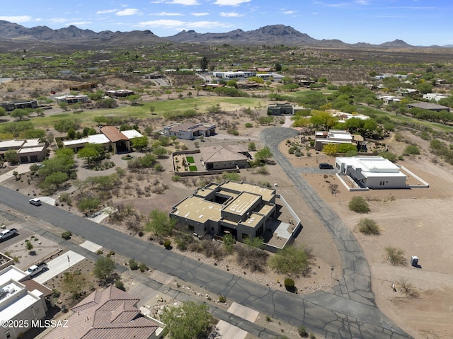 birds eye view of property with a mountain view and a residential view